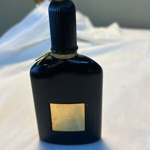 Tom Ford Black Bottle with Gold Accents